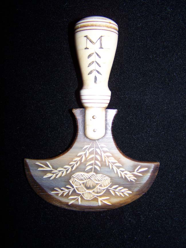 An Ivory Handled Baleen Chopper with the name 'Marion' on it.